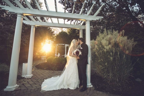 Amazing Outdoor Wedding Ceremony Venue Bride Groom Kissing At Sunset