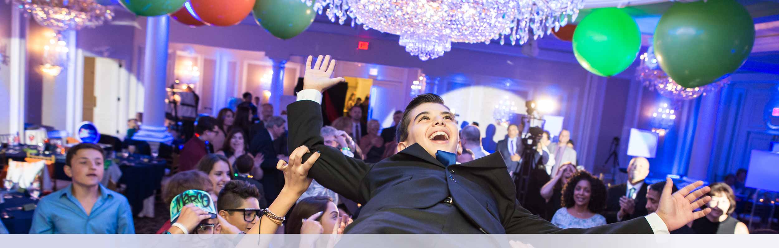 Gallery Banner 5 Teen Boy Being Lifted Bar Mitzvah