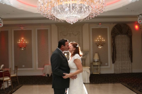 Elegant Chandelier Kiss Bride Groom