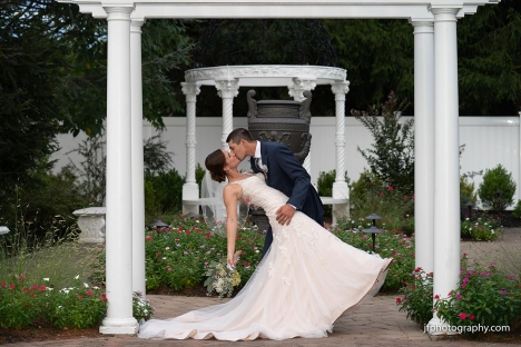 New Jersey Wedding Venue Garden Kissing Bride Groom